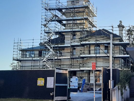 Smithfield Grange 88 Brook Street, Coogee, surrounded by scaffolding, in 2022